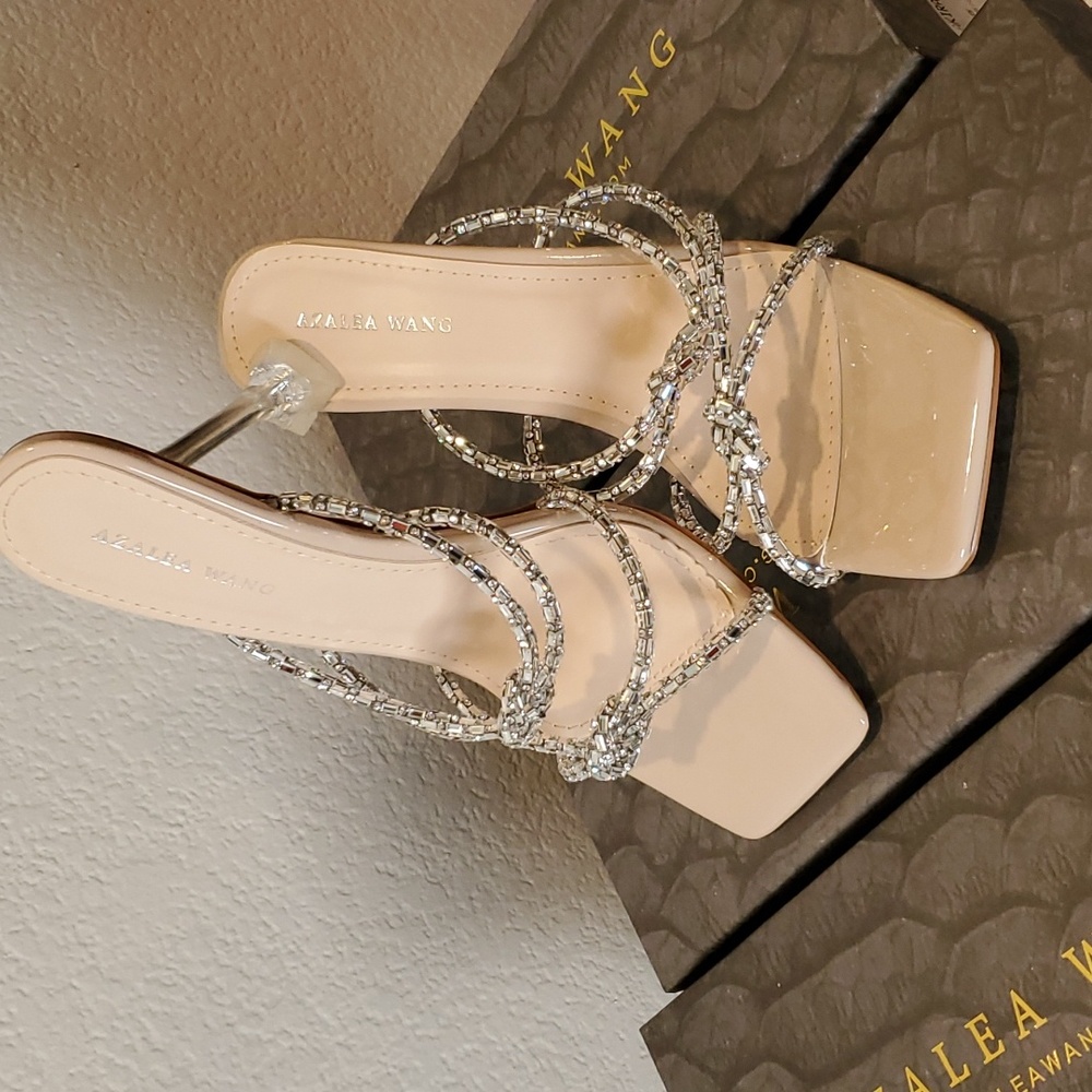 Clear stiletto sandal in Nude with rhinestone knot straps